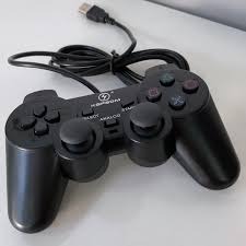 Gamer controle com fio Kapbom KAP-3W compatível com PlayStation 3 e PC. 